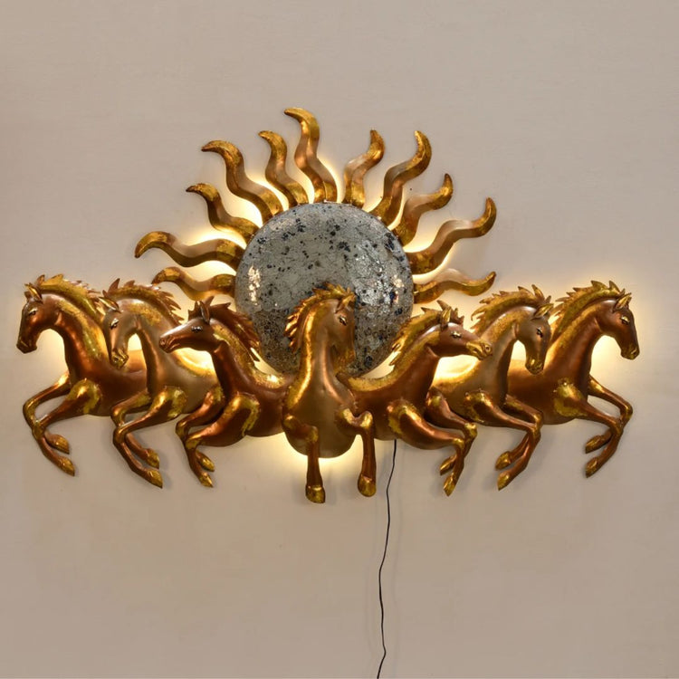 This Gold 7 Horses with Sun Metal Wall Art is the perfect addition to any living room. Crafted from metal, it features striking gold coloring and an iconic 7 horses with sun design. Hang it in any space to bring warmth and personality to your interior. Size: 48 x 27 Inches. Made of High-Quality Iron Metal Anti-rust powder coating used for long lasting finish Hanging Mechanism included Horse wall decor with led lighting