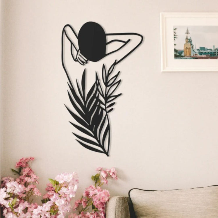 Introduce an earthy feel to your living room with our Woman with Leaves Metal Wall Art. Crafted from high-quality metal, this beautiful piece features intricate cutouts of a woman surrounded by leaves. Add a touch of nature to your space and enhance its aesthetic appeal-Measures 20 x 28 inches-Constructed of High Quality Metal-Anti-rust powder coating used for long lasting finish Hanging Mechanism included Perfect for your living room, bedroom, hall, office reception, guest room, and hotel reception