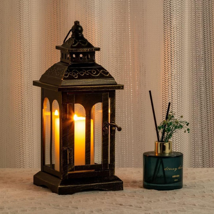 Vintage Black Metal Lantern Candle Holder for Home and Garden Decor-Hansart-Hansart, Add a touch of timeless elegance to your indoor or outdoor space with this Vintage Black Metal Lantern. Crafted from premium metal and clear glass panels, this lantern beautifully showcases the flickering glow of candles, whether real or flameless LED. Its windproof design ensures a steady flame, making it ideal for patios, gardens, weddings, or cozy indoor settings. With its antique finish and versatile style, this lantern