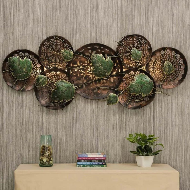 This Hansart Special Floral with Green Leaves Metal Wall Art is the perfect addition to your living room or hall. This decorative piece features a beautiful floral design with green leaves. Enhance the aesthetic of your space with this elegant and versatile metal wall art.