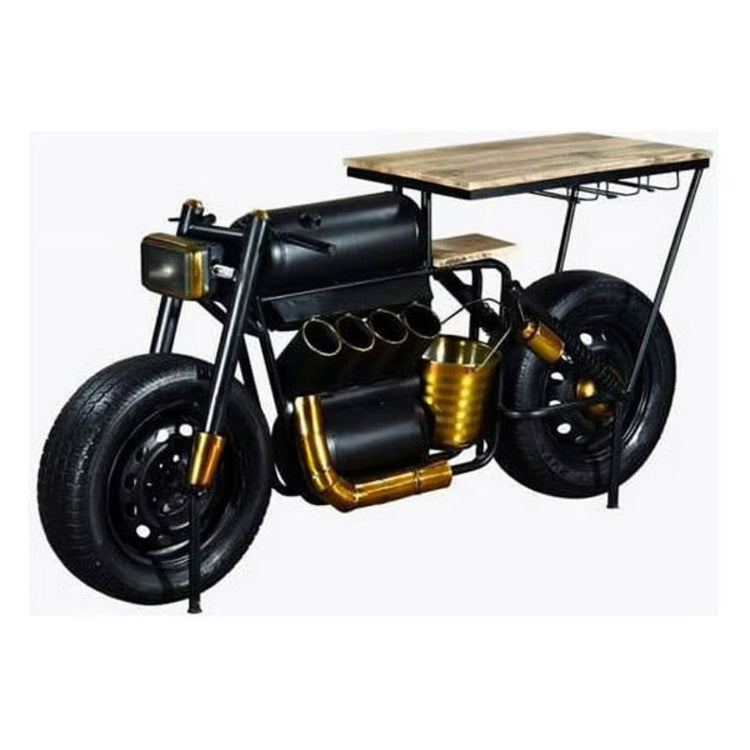 A bar table with a vintage motorcycle design, featuring a wooden tabletop, built-in wine rack, and glass holders. The table is styled with a black and gold finish and has a realistic motorcycle frame as a decorative element.