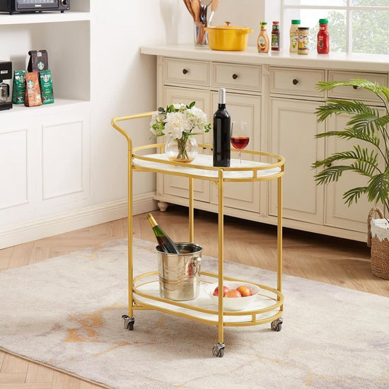 Yellow bar cart with drinks and snacks in a kitchen setting
