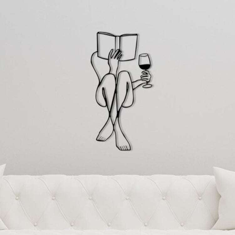Elevate your home deThis stunning piece features a woman holding a glass of wine, adding a touch of sophistication and elegance to any room. Crafted with metal, it is both durable and visually appealing. Unleash your inner art enthusiast and make a statement in your home to-Measures 22 x 33 Inches-Constructed of High Quality Metal-Anti-rust powder coating used for long lasting finish Hanging Mechanism included Perfect for your living room, bedroom, hall, office reception, guest room, and hotel reception