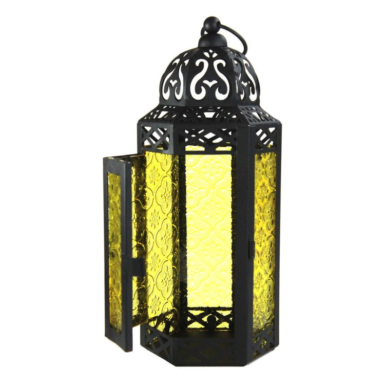 Vintage Moroccan Style Black Lantern with Yellow Glass Panels-Hansart-Hansart, Add a touch of exotic elegance to your home décor with this beautifully crafted Moroccan-style lantern. Featuring intricate cut-out patterns on a sturdy metal frame and vibrant yellow embossed glass panels, this lantern casts a warm, inviting glow when lit. Standing 11.5 inches tall, it’s perfect for tabletop centerpieces, hanging displays, or as a charming accent in both indoor and outdoor settings. Whether used with candles or