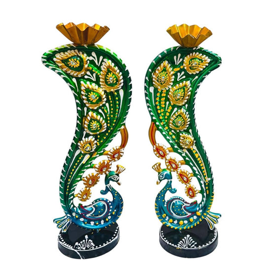 Pair of decorative vases with peacock designs on a white background