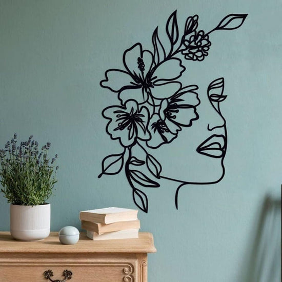 Add a touch of nature to your living room with our Flower Face Metal Wall Art. This unique piece features an intricate design of flowers, adding a personality to any space-Measures 20 x 28 inches-Constructed of High Quality Met-Anti-rust powder coating used for long lasting finish Hanging Mechanism included Perfect for your living room, bedroom, hall, office reception, guest room, and hotel reception