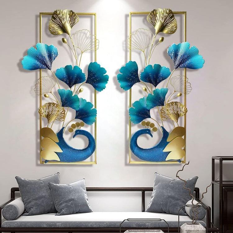 A set of two vertical frame metal wall art featuring a peacock and leaves with a gold and multicolor design.