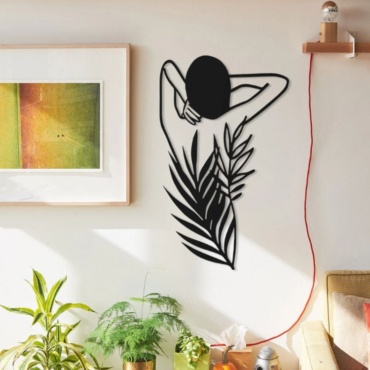 Introduce an earthy feel to your living room with our Woman with Leaves Metal Wall Art. Crafted from high-quality metal, this beautiful piece features intricate cutouts of a woman surrounded by leaves. Add a touch of nature to your space and enhance its aesthetic appeal-Measures 20 x 28 inches-Constructed of High Quality Metal-Anti-rust powder coating used for long lasting finish Hanging Mechanism included Perfect for your living room, bedroom, hall, office reception, guest room, and hotel reception