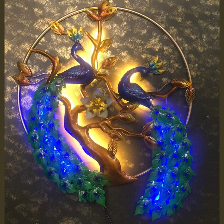 Experience the beauty of nature with our Double Peacock Metal Wall Art. This stunning piece, featuring two intricately crafted peacocks surrounded by nature, will add a touch of elegance to your living room. Measuring <strong>29 x 38 inches</strong>, this metal wall art is the perfect addition to any home decor.</span></li> <li>Made of High-Quality Iron Metal</li> <li>Anti-rust powder coating used for long lasting finish</li> <li>Hanging Mechanism included</li> <li>Peacock wall decor with led lighting