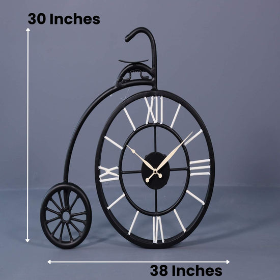 This Vintage Wheel Metal Wall Clock is the perfect addition to any living room. Crafted with durable metal, it features a vintage wheel design that adds a touch of unique charm to any space. Keep track of time in style while adding a touch of retro appeal to your home decor.