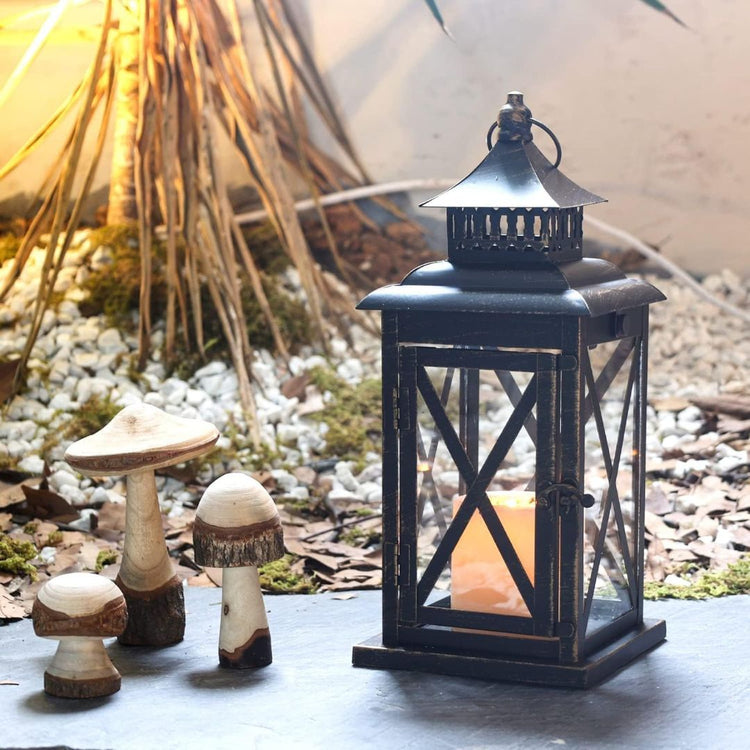 Vintage Black Candle Lantern Holder for Indoor Outdoor Decoration-Hansart-Hansart, Add a touch of vintage charm and warm ambiance to your space with this Rustic Black Metal Candle Lantern. Crafted from durable metal with clear glass panels, this lantern features an elegant cross-frame design and distressed finish, making it a perfect addition to both indoor and outdoor decor. Place a real or flameless LED candle inside to create a cozy glow on your patio, living room, garden, or during special events like w