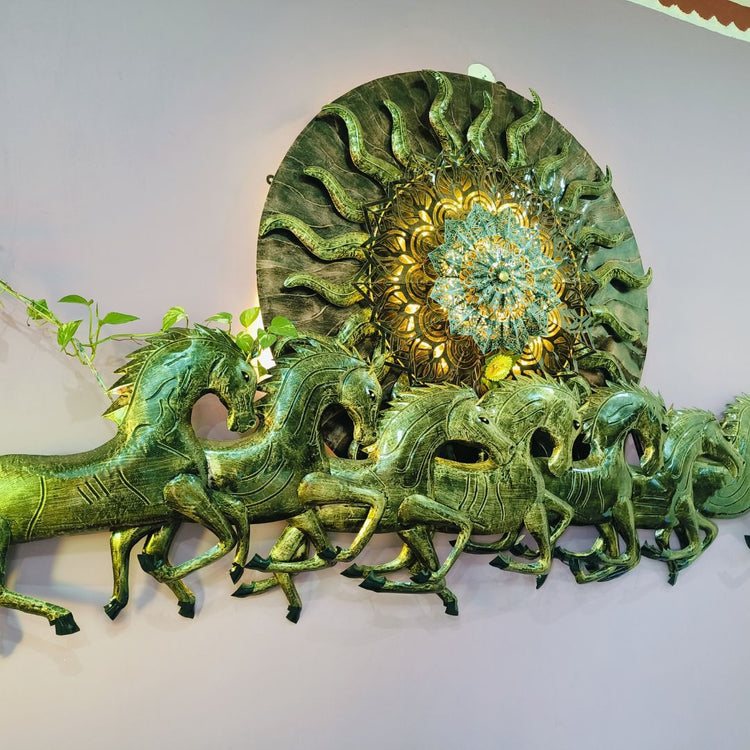 96 Inches Antique 7 Horses with Sun Metal Wall Art for Living Room. HANSART. This stunning 96 x 48 Inches (8 x 4 ft.) metal wall art features an intricate design of seven galloping horses, symbolizing strength, success, and prosperity, along with a radiant sun in the background. Crafted with a combination of antique gold and green shades, this piece is an elegant addition to any home or office decor. The detailed carving and textured finish give it a luxurious and traditional aesthetic.