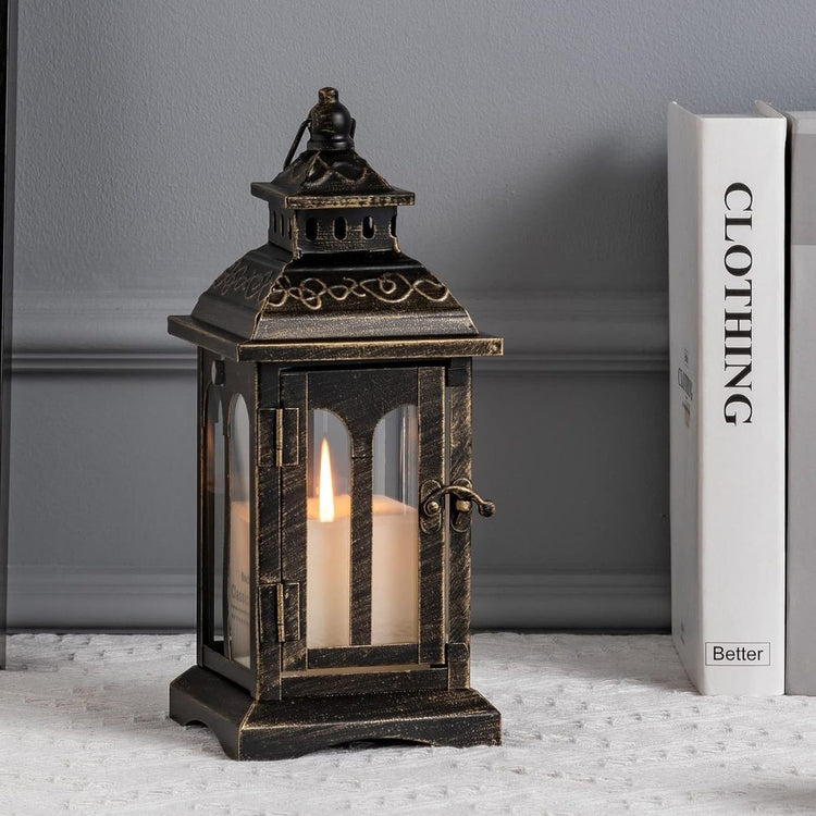 Vintage Black Metal Lantern Candle Holder for Home and Garden Decor-Hansart-Hansart, Add a touch of timeless elegance to your indoor or outdoor space with this Vintage Black Metal Lantern. Crafted from premium metal and clear glass panels, this lantern beautifully showcases the flickering glow of candles, whether real or flameless LED. Its windproof design ensures a steady flame, making it ideal for patios, gardens, weddings, or cozy indoor settings. With its antique finish and versatile style, this lantern
