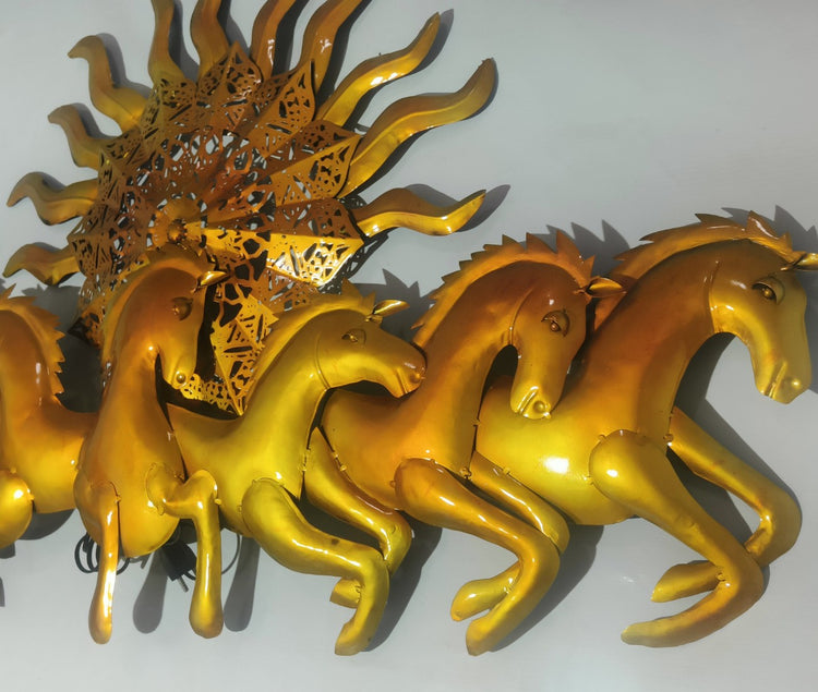 This Designer Gold metal wall art features a stunning depiction of 7 galloping horses against a warm sun backdrop. At 48 x 28 inches, it is sure to make a statement in any room. The integrated LED lights add a touch of modernity and ambiance. Perfect for any equestrian enthusiast. Size: 48 x 28 Inches. Made of High-Quality Iron Metal Anti-rust powder coating used for long lasting finish Hanging Mechanism included Horse wall decor with led lighting Perfect for your living room, bedroom, hall, office recept