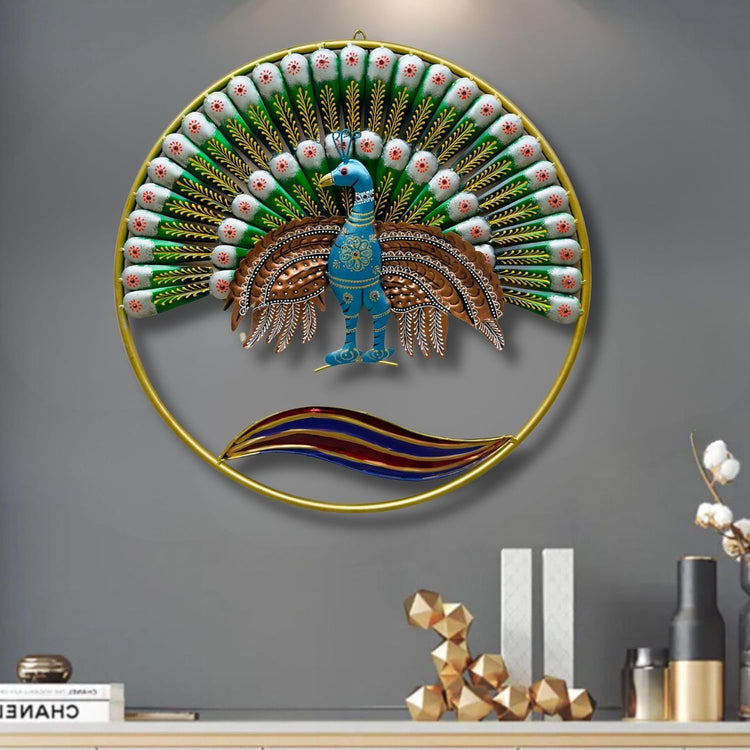 Decorative wall art of a peacock with a gold frame on a gray wall.