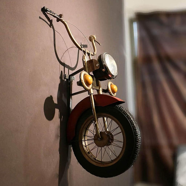 HANSART, Bring a bold and nostalgic touch to your space with this Vintage Motorcycle Front Wall Decor. Designed to replicate the front of a classic motorcycle, this unique wall art piece features realistic details including a metal handlebar, headlight, and tire. The industrial retro finish and authentic styling make it a perfect statement piece for garages, cafes, man caves, or any space in need of a rugged, adventurous vibe.