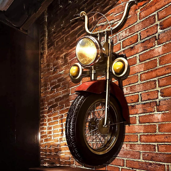 HANSART, Bring a bold and nostalgic touch to your space with this Vintage Motorcycle Front Wall Decor. Designed to replicate the front of a classic motorcycle, this unique wall art piece features realistic details including a metal handlebar, headlight, and tire. The industrial retro finish and authentic styling make it a perfect statement piece for garages, cafes, man caves, or any space in need of a rugged, adventurous vibe.