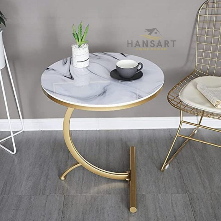 Golden framed Designer white top Round Table-Hansart, Tables, Designer Tables by Hans Art Specifications: Top: 14x14 Inches, Height: 18 Inches Metal body base (Rust Free) Premium Quality Metal Construction Hand Crafted Tables Best for your living room, drawing room, guest room, hall and reception The product is packed by professionals for safe delivery Designed to make your home look complete "Hansart Made In India"