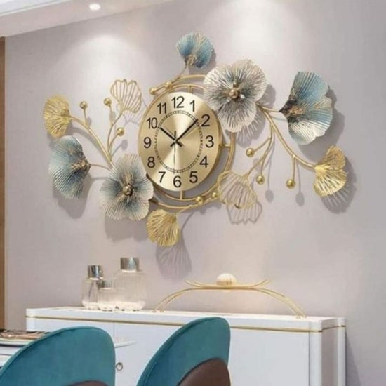 Floral Metal Wall Clock for Living Room and Hall. Metal Wall Decor by Hansart Abstract wall art Total Wall Coverage Area: 48 x 24 Inches Made of Premium-Quality Iron Metal Anti-rust powder coating used Hanging Mechanism included Perfect for your living room, bedroom, hall, office reception, guest room, and hotel reception The product is packed by professionals for safe delivery Designed to make your home look complete "Hansart Made In India because India itself is an art".