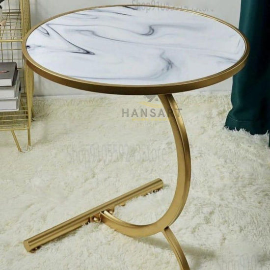 Golden framed Designer white top Round Table-Hansart, Tables, Designer Tables by Hans Art Specifications: Top: 14x14 Inches, Height: 18 Inches Metal body base (Rust Free) Premium Quality Metal Construction Hand Crafted Tables Best for your living room, drawing room, guest room, hall and reception The product is packed by professionals for safe delivery Designed to make your home look complete "Hansart Made In India"