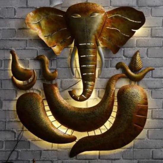 Hansart Special Ganeshji Metal Wall Art-Metal Wall Decor by Hansart Total Wall Coverage Area: 20 x 30 Inches & 30 x 40 Inches Made of Premium-Quality Iron Metal Anti Rust Powder Coating Used Hanging Mechanism Included Perfect for your living room, bedroom, hall, office reception, guest room, and hotel reception The product is packed by professionals for safe delivery Designed to make your home look complete