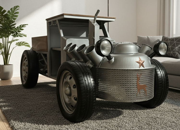 Metallic car with star and deer design on a carpeted floor.