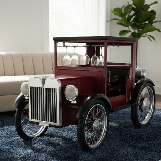 Vintage-style car-shaped wine storage with glass holders on a blue rug.