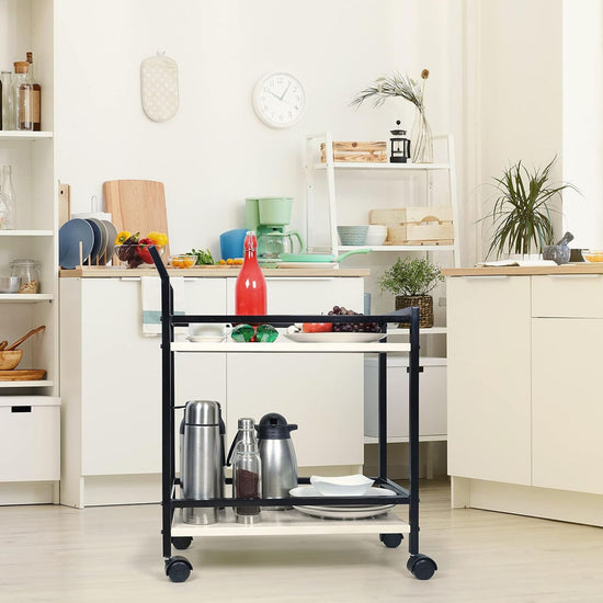 Black serving cart in a kitchen setting with various items on it.