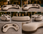 Collage of a modern outdoor sofa with brown accents in various angles.