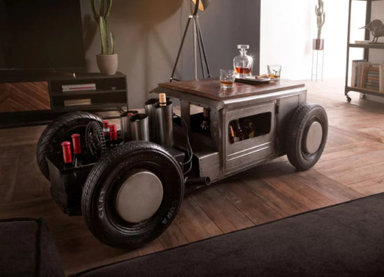 Wooden table with large wheels in a living room setting