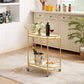 Yellow bar cart with drinks and snacks in a kitchen setting
