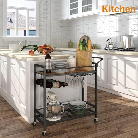 Kitchen island with a rolling cart holding kitchen items in a bright kitchen.