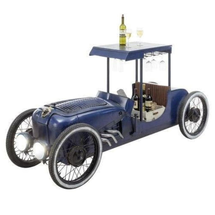 Vintage car-shaped bar cart with bottles and glasses on a white background