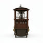 Wooden bar cart with wine glass holders and bottle stoppers on a white background