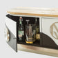 Modern sideboard with open cabinet displaying bottles and glasses on a light gray background