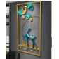 Decorative wall art with a blue deer and colorful leaves in a modern interior setting