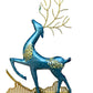 Decorative wall art with a blue deer and colorful leaves in a modern interior setting