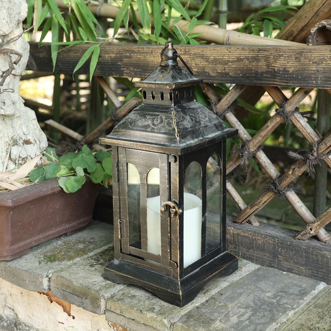 Vintage Black Metal Lantern Candle Holder for Home and Garden Decor-Hansart-Hansart, Add a touch of timeless elegance to your indoor or outdoor space with this Vintage Black Metal Lantern. Crafted from premium metal and clear glass panels, this lantern beautifully showcases the flickering glow of candles, whether real or flameless LED. Its windproof design ensures a steady flame, making it ideal for patios, gardens, weddings, or cozy indoor settings. With its antique finish and versatile style, this lantern